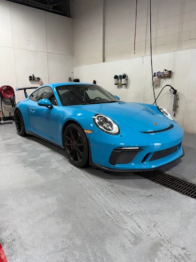 Miami blue Porsche 911 GT3 after detailing